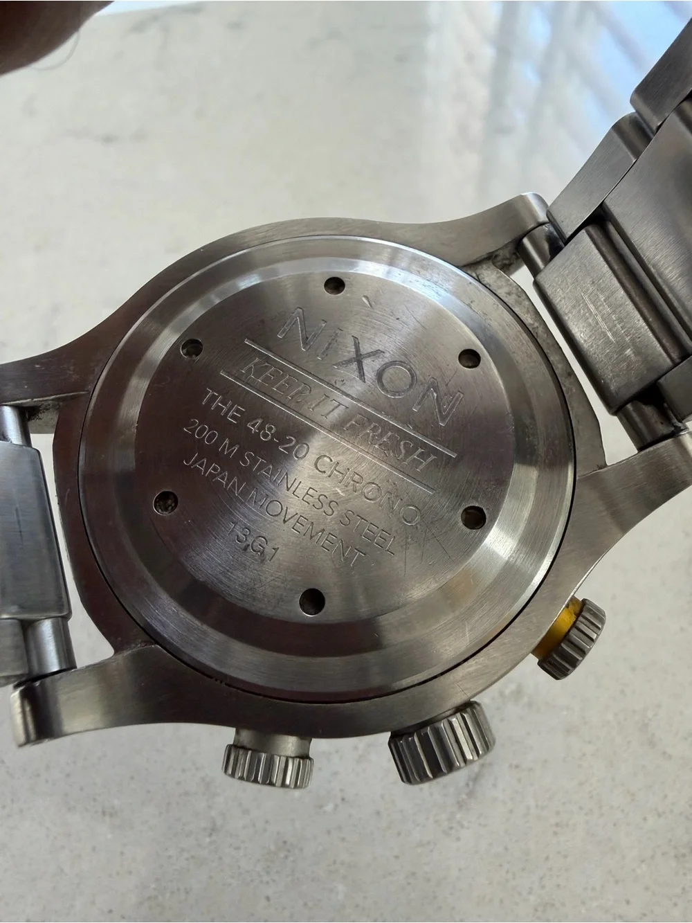 Nixon Stainless Steel Chronograph Watch — Black Dial with Yellow Accents